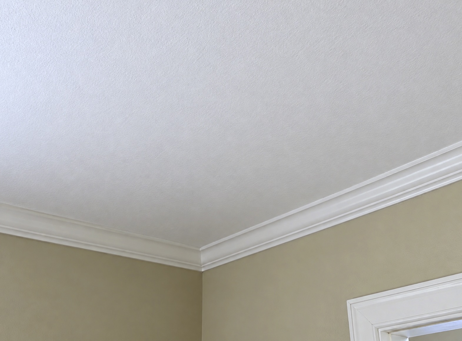 Same ceiling after drywall repair, texture, and paint