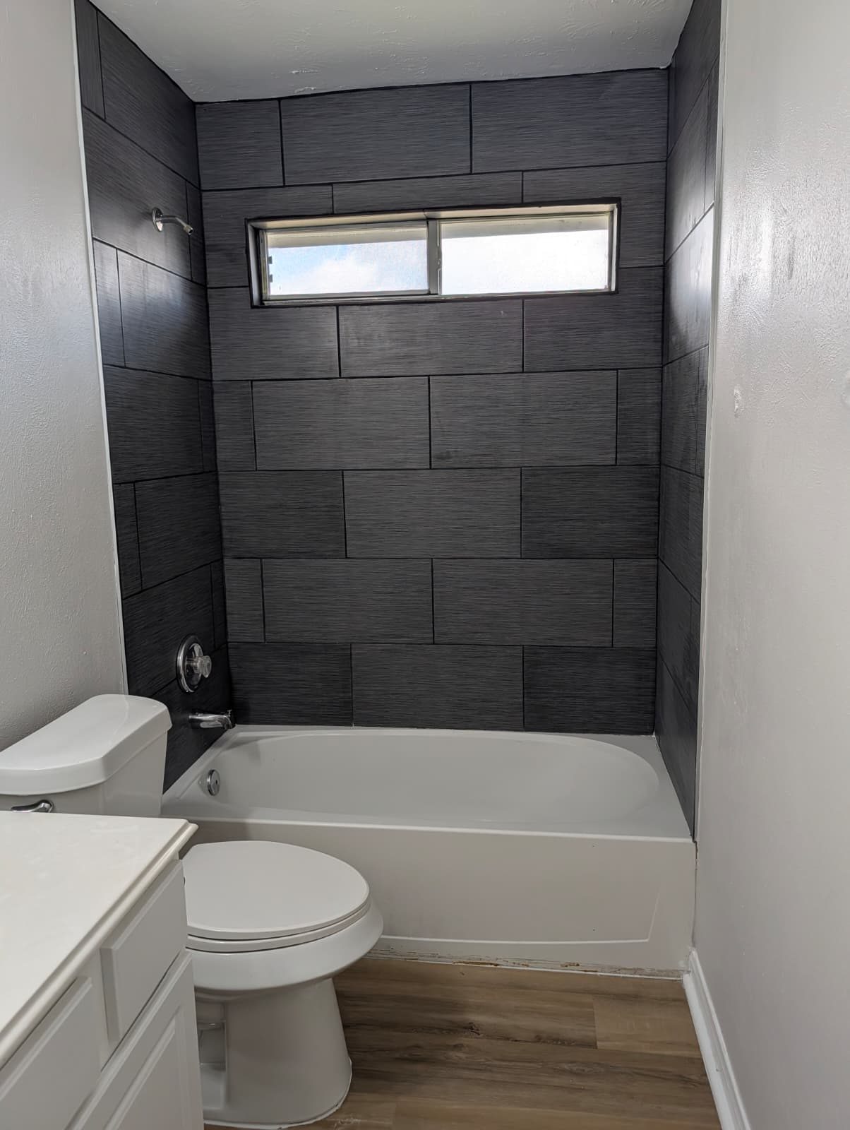 Full bathroom after remodel seen from the doorway
