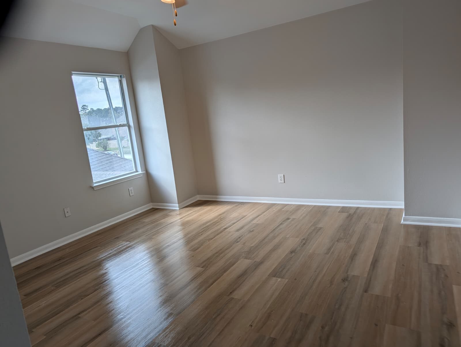 Empty finished bedroom after paint and flooring