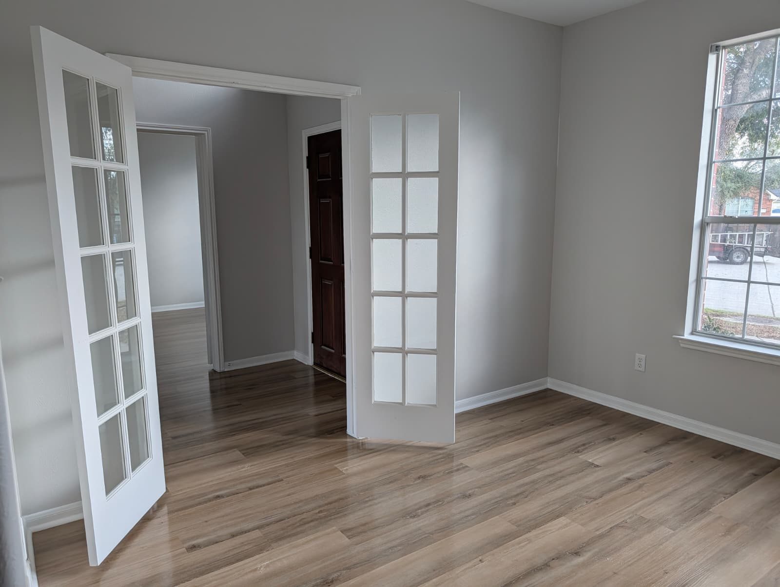 French doors opening between rooms after the remodel