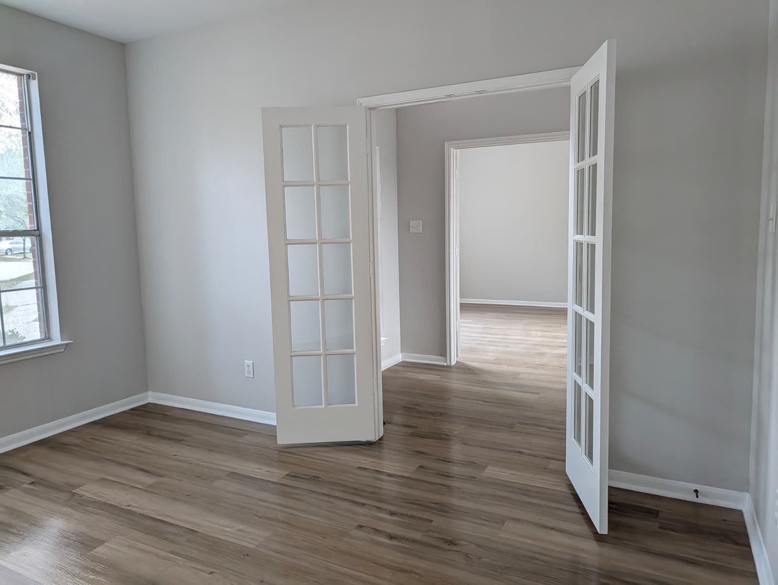 Open French doors between finished rooms