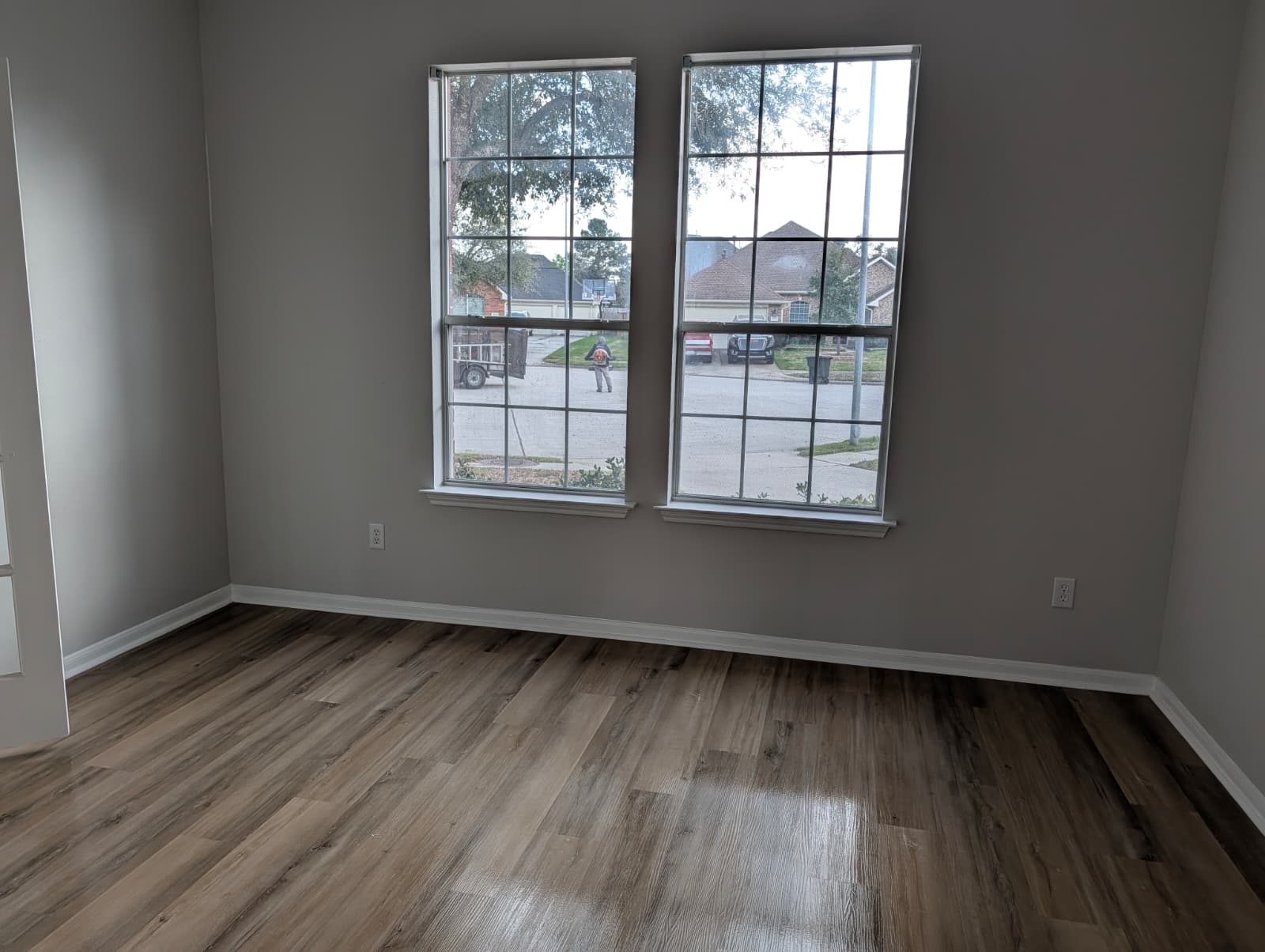 Front room after remodel with new floors and fresh paint