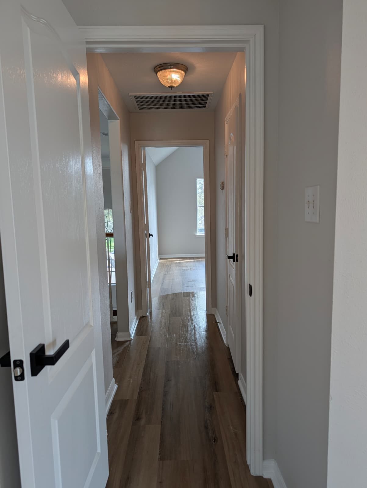 Hallway after paint and new flooring