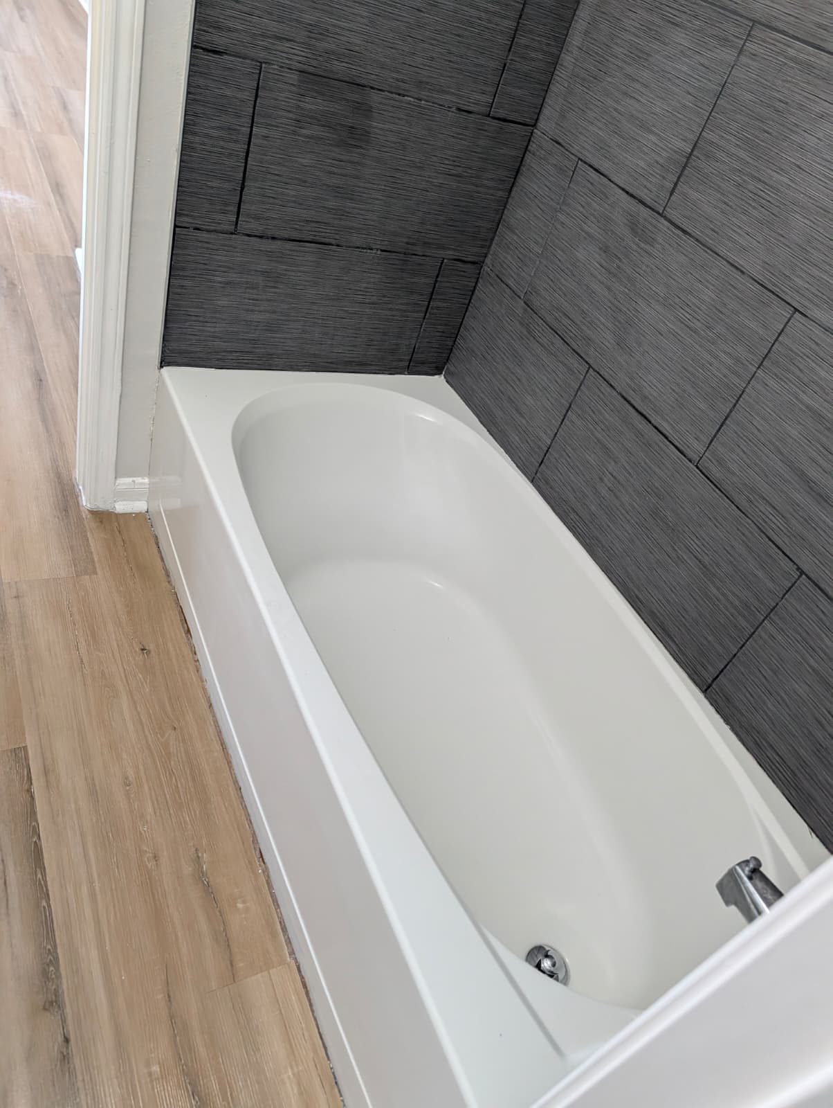 Finished tub and tile in the remodeled bathroom